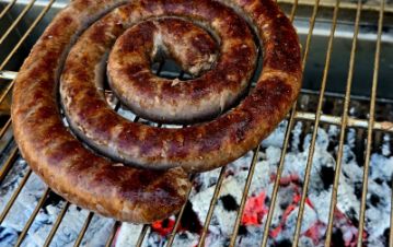 Boerewors cooking on Charcoal.jpg